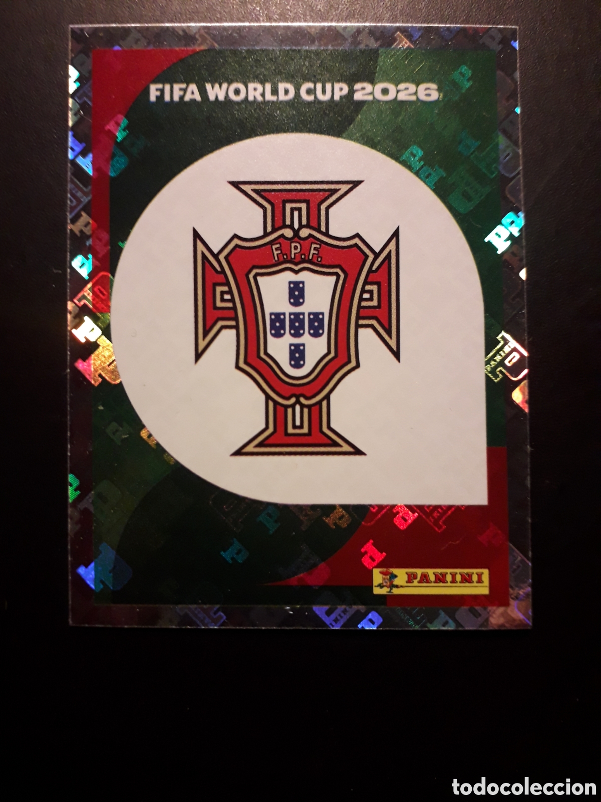 Cromos de F&uacute;tbol: ESCUDO PORTUGAL POR 1 MUNDIAL F&Uacute;TBOL 2026 FIFA WORLD CUP PANINI SIN PEGAR PEDIDO M&Iacute;NIMO 3&euro;