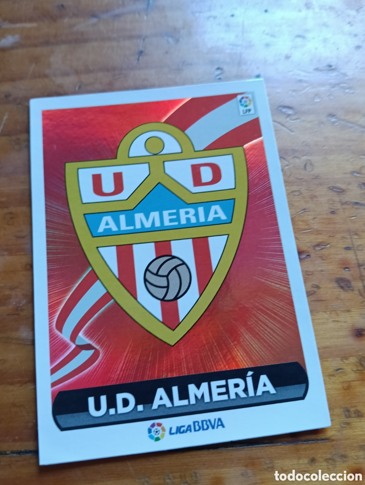Cartes &agrave; collectionner de Football: Cromo N&deg;23 Escudo (U.D Almer&iacute;a) LaLiga Este 2014-15 Panini