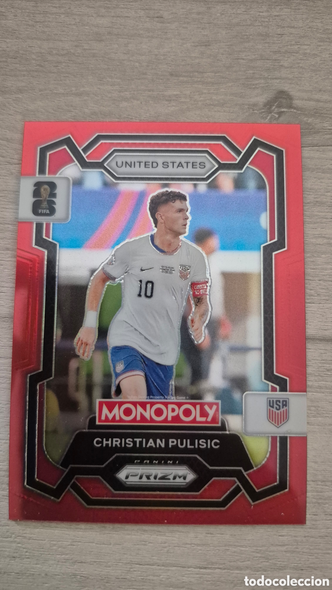 Cromos de F&uacute;tbol: Chistian Pulisic Red Panini Monopoly Prizm FIFA World Cup 2026