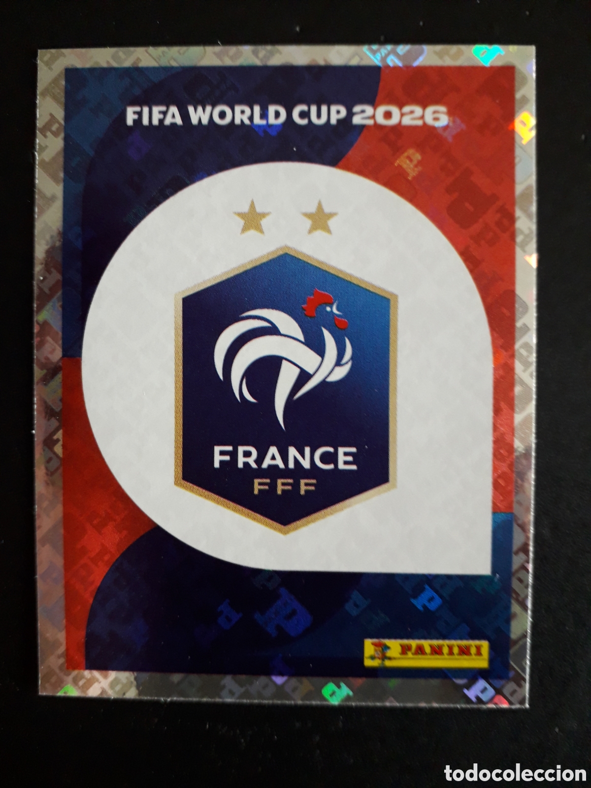 Cromos de F&uacute;tbol: ESCUDO FRANCIA FRA 1 MUNDIAL F&Uacute;TBOL 2026 FIFA WORLD CUP PANINI SIN PEGAR PEDIDO M&Iacute;NIMO 3&euro;