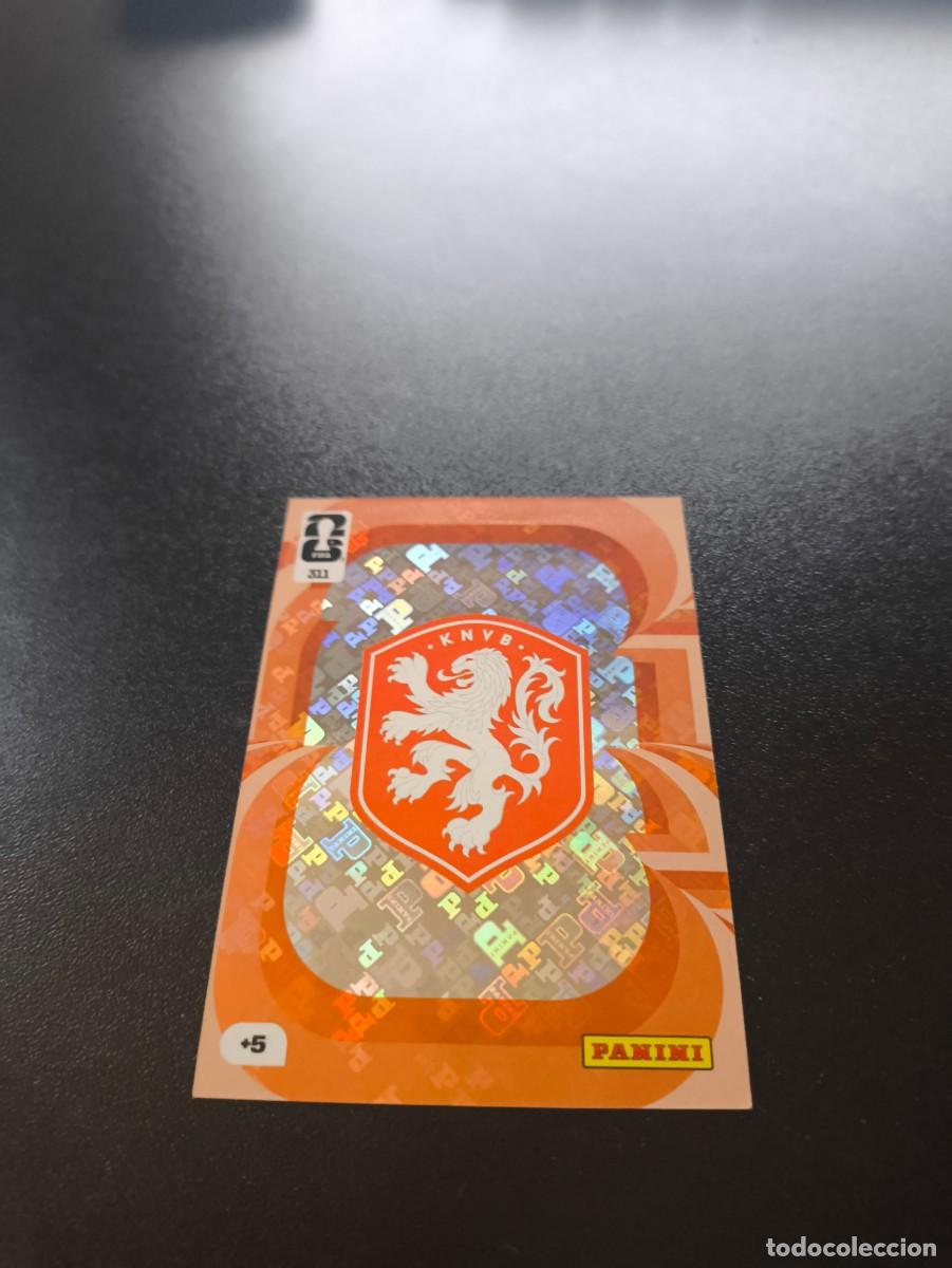 Cromos de F&uacute;tbol: 311 ESCUDO EMBLEMA PAISES BAJOS HOLANDA ADRENALYN MUNDIAL FIFA WORLD CUP 2026 PANINI