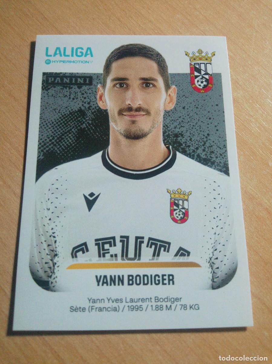Fu&szlig;ball-Sticker: 124 YA N BODIGER DEL CEUTA 2&ordf; DIVISION HYPERMOTION 25 26 PANINI 2025 2026