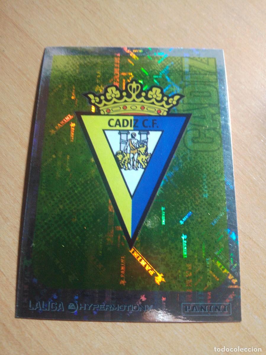 Cromos de F&uacute;tbol: 78 ESCUDO DEL C&Aacute;DIZ 2&ordf; DIVISION HYPERMOTION 25 26 PANINI 2025 2026