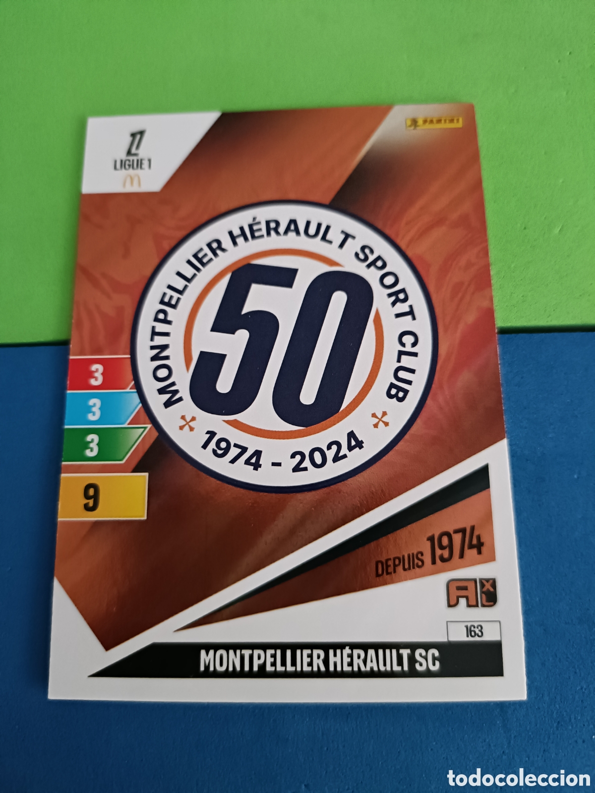 Cartes &agrave; collectionner de Football: LIGUE 1 FRANCIA FRANCE ADRENALYN XL 24 25 2024 2025 - 163 Escudo Montpellier Herault