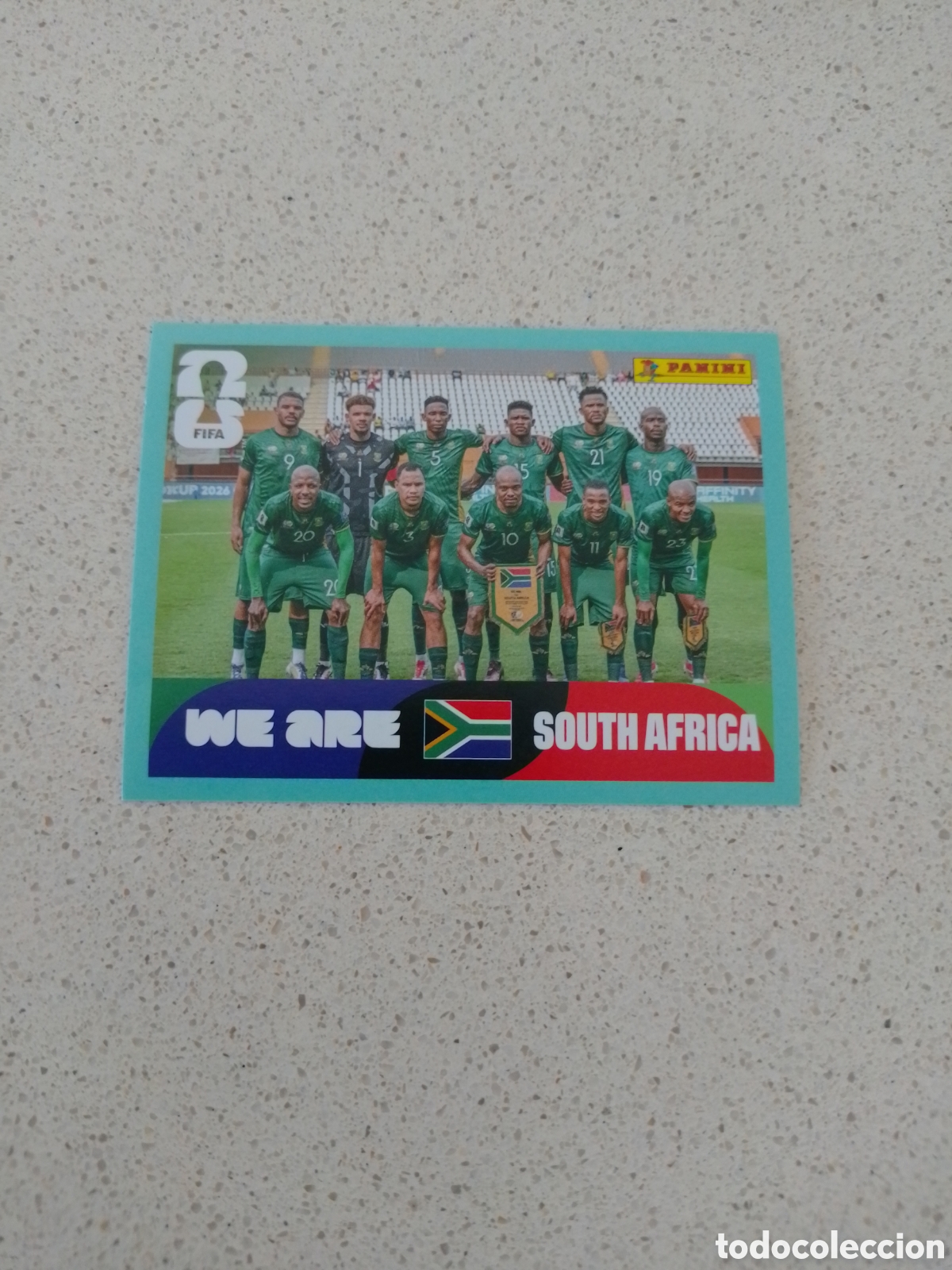 Cromos de F&uacute;tbol: CROMO NUMERO 13 EQUIPO SUDAFRICA. MUNDIAL 2026. PANINI.