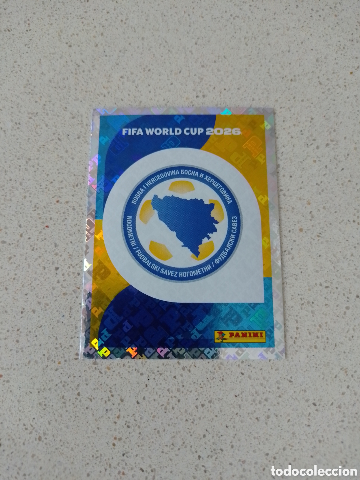 Cromos de F&uacute;tbol: CROMO NUMERO 1 ESCUDO BOSNIA HEZERGOVINA. MUNDIAL 2026. PANINI.