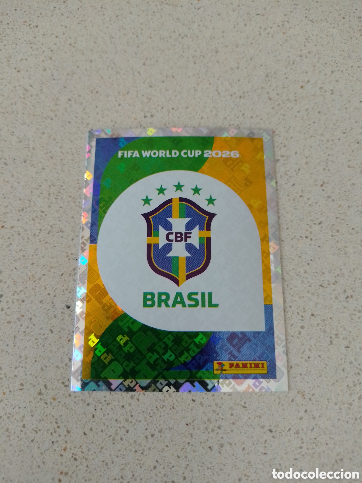Cromos de F&uacute;tbol: CROMO NUMERO 1 ESCUDO BRASIL. MUNDIAL 2026. PANINI.