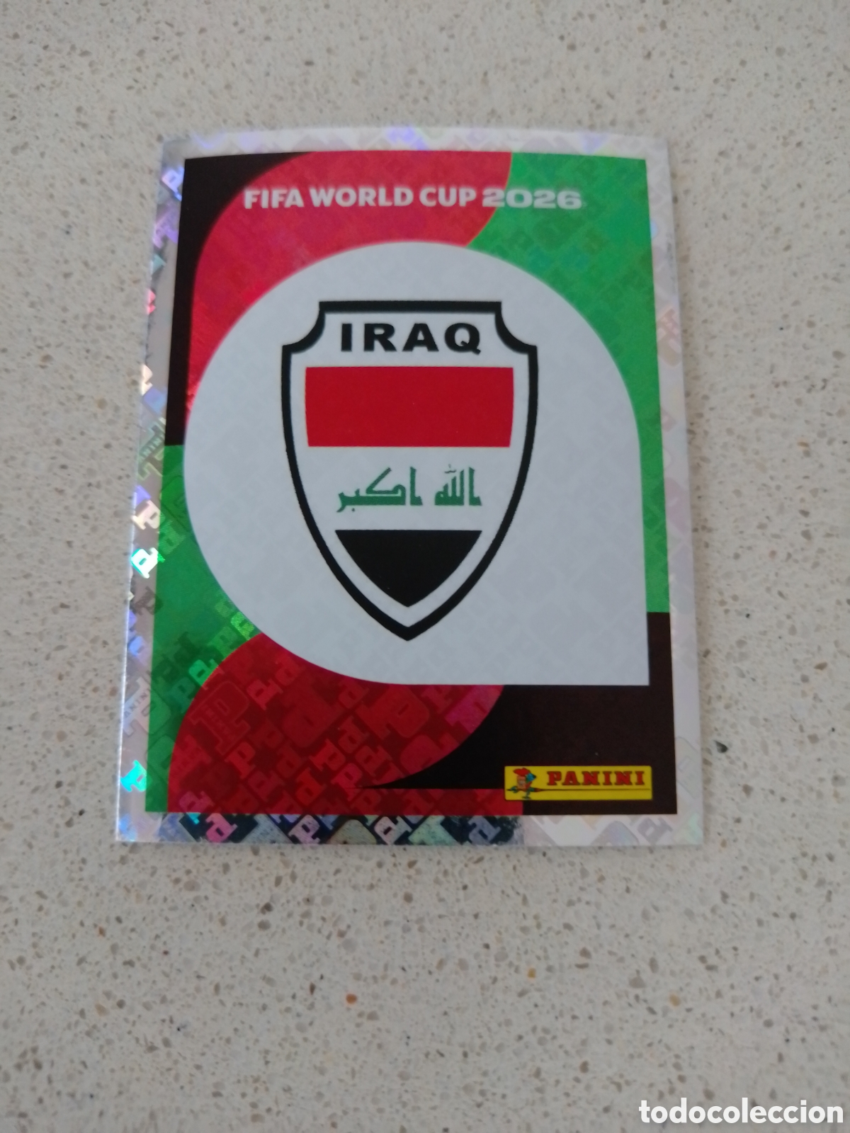 Cromos de F&uacute;tbol: CROMO NUMERO 1 ESCUDO IRAQ. MUNDIAL 2026. PANINI.
