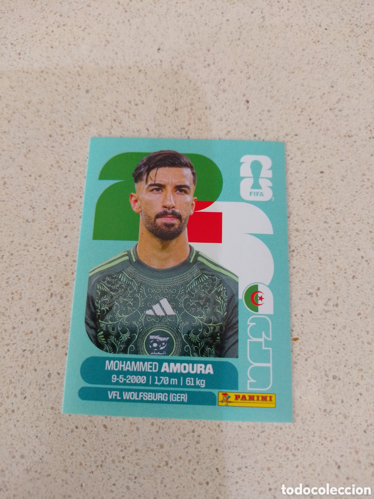 Cartes &agrave; collectionner de Football: CROMO NUMERO 20 AMOURA ARGELIA. MUNDIAL 2026. PANINI.