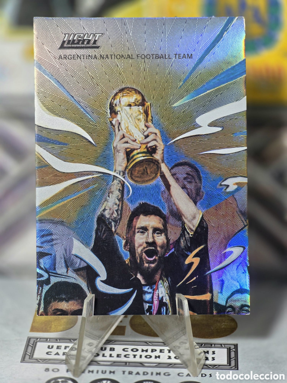 Cromos de F&uacute;tbol: FansMall Light 2022 Lionel Messi #2 Argentina SSP 1:12500 Holo Ic&oacute;nico WC