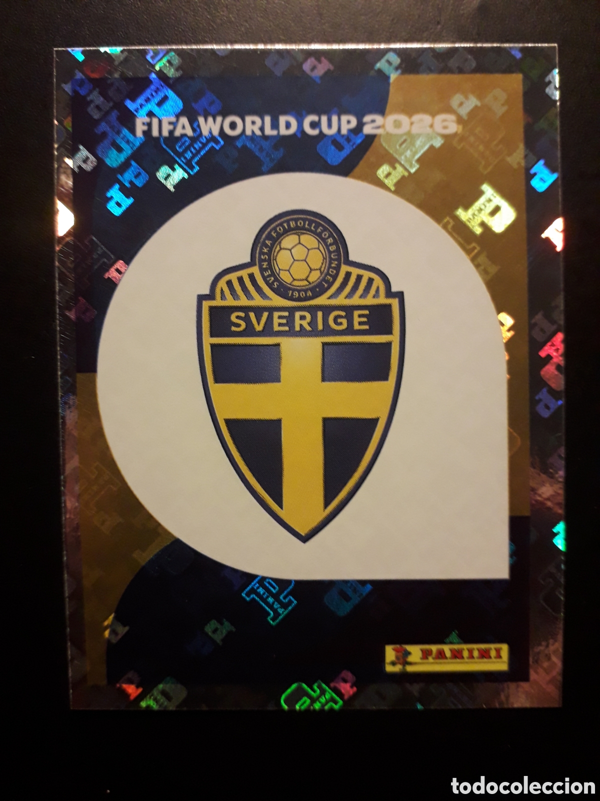 Cromos de F&uacute;tbol: ESCUDO SUECIA SWE 1 MUNDIAL F&Uacute;TBOL 2026 FIFA WORLD CUP PANINI SIN PEGAR PEDIDO M&Iacute;NIMO 3&euro;.