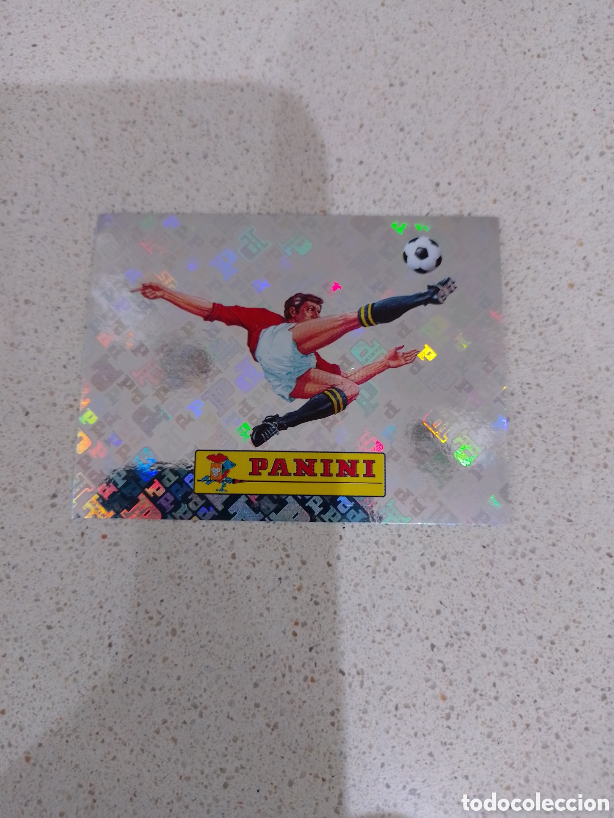 Figurine di Calcio: CROMO N&Uacute;MERO 00 LOGO PANINI. MUNDIAL 2026.