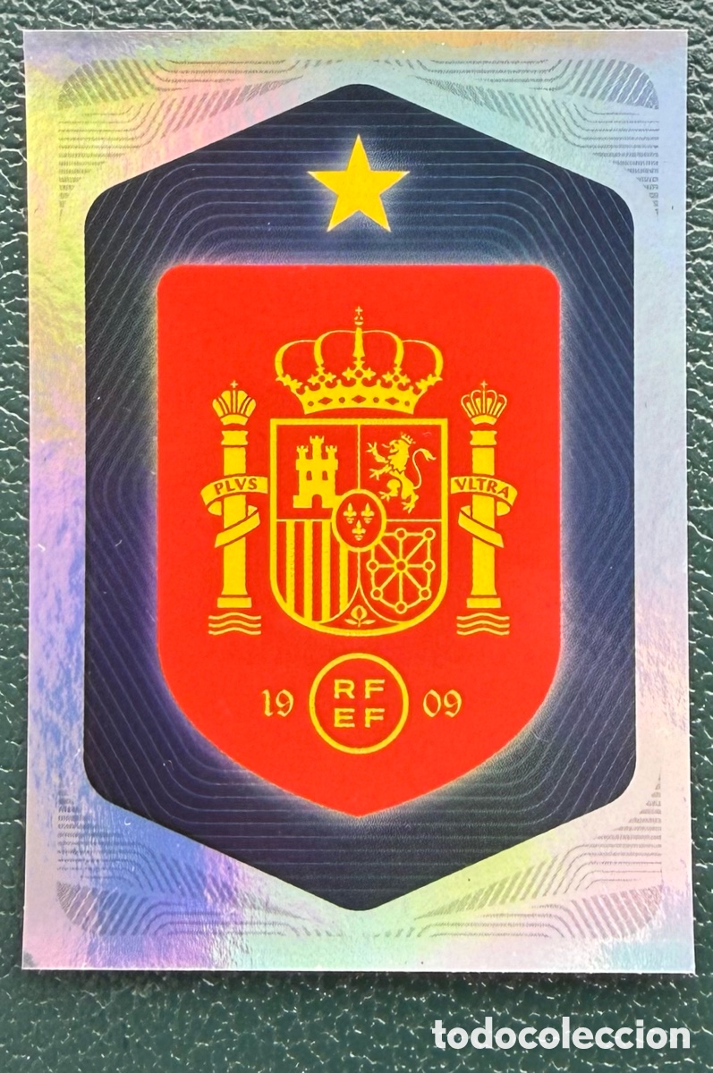 Fu&szlig;ball-Sticker: 1 ESCUDO COLECCI&Oacute;N OFICIAL DE LA SELECCI&Oacute;N ESPA&Ntilde;OLA 2026 CARREFOUR PANINI ESPA&Ntilde;A