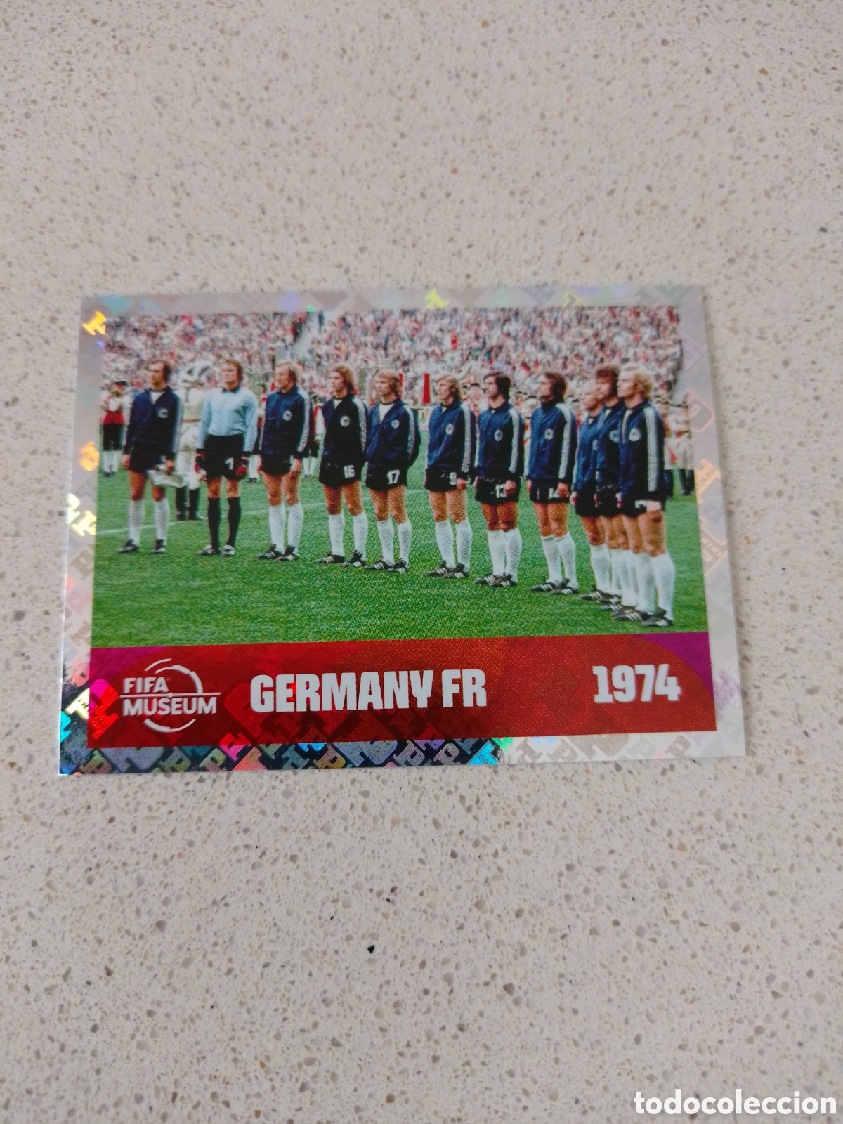 Cromos de F&uacute;tbol: CROMO NUMERO FWC 13 ALEMANIA CAMPEOMA 1974. MUNDIAL 2026. PANINI.