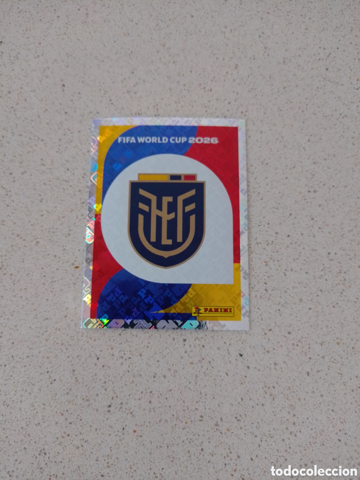 Cromos de f&uacute;tbol: CROMO NUMERO 1 ESCUDO ECUADOR. MUNDIAL 2026. PANINI.