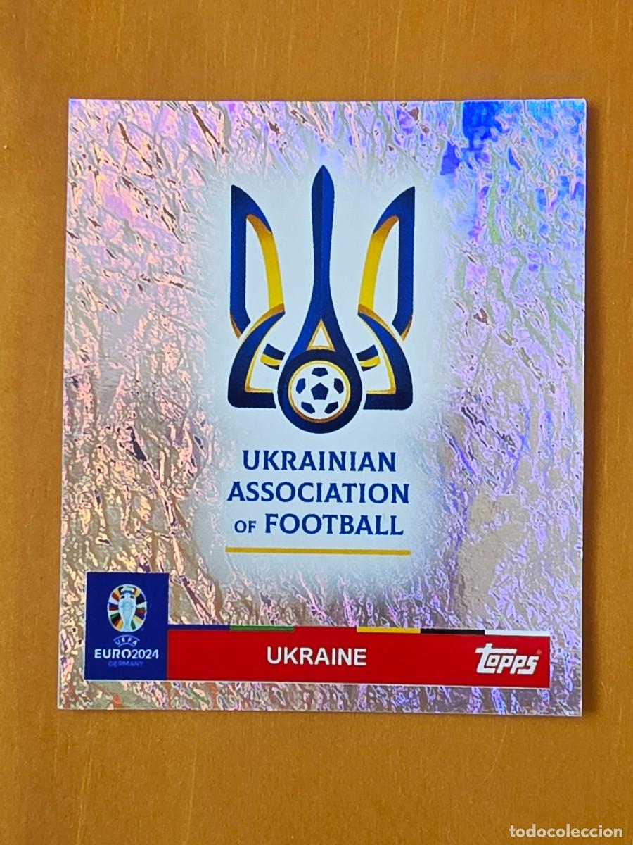 Cromos de f&uacute;tbol: UKR 1 Escudo logo Ucrania, Topps UEFA Euro 2024, Eurocopa Germany 24 sticker
