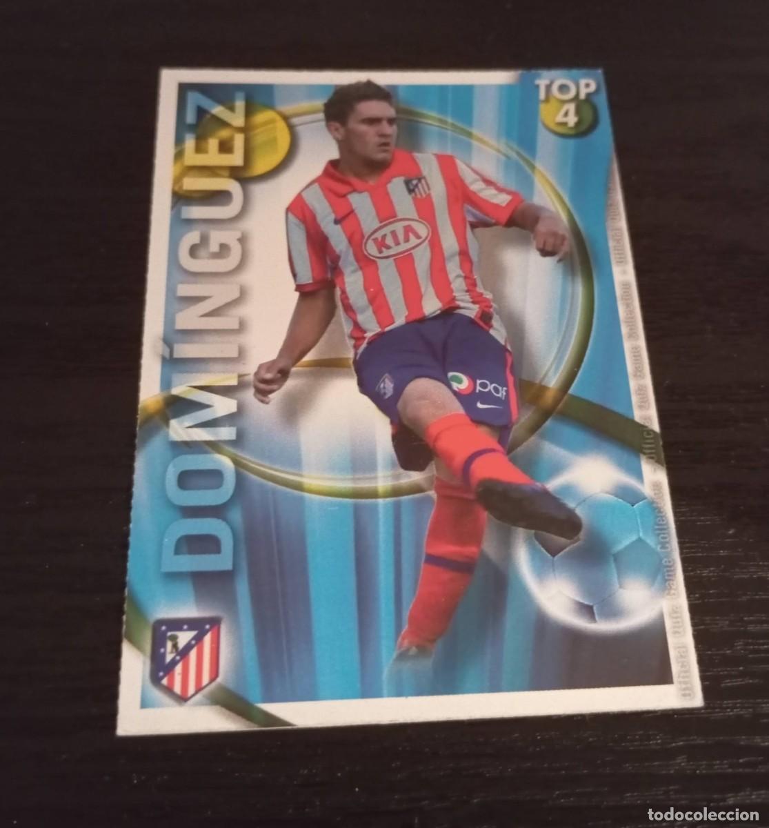 Cromos de f&uacute;tbol: -MUNDICROMO 2011 : 636 DOMINGUEZ ( AT.MADRID ) -- TOP AZUL BRILLO LISO -- ERROR