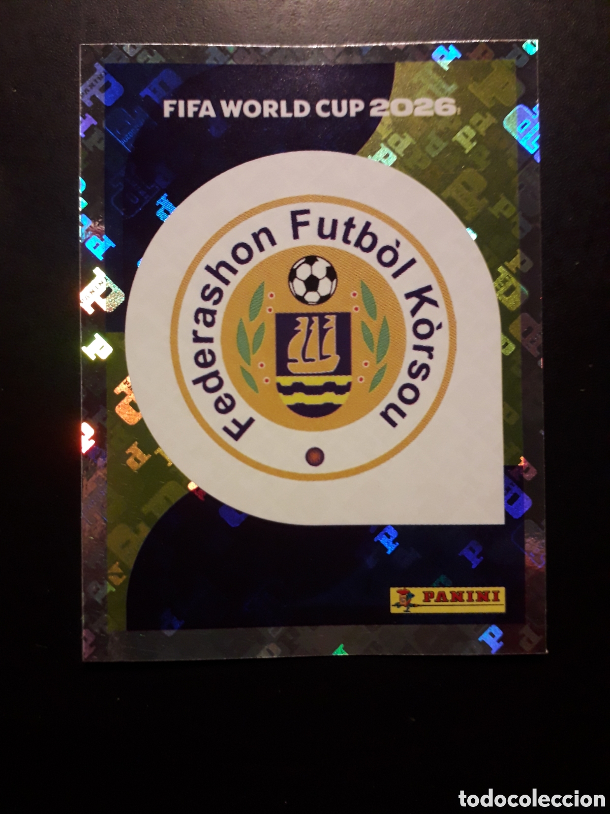 Cromos de f&uacute;tbol: ESCUDO CURA&Ccedil;AO CUW 1 MUNDIAL F&Uacute;TBOL 2026 FIFA WORLD CUP PANINI SIN PEGAR PEDIDO M&Iacute;NIMO 3&euro;