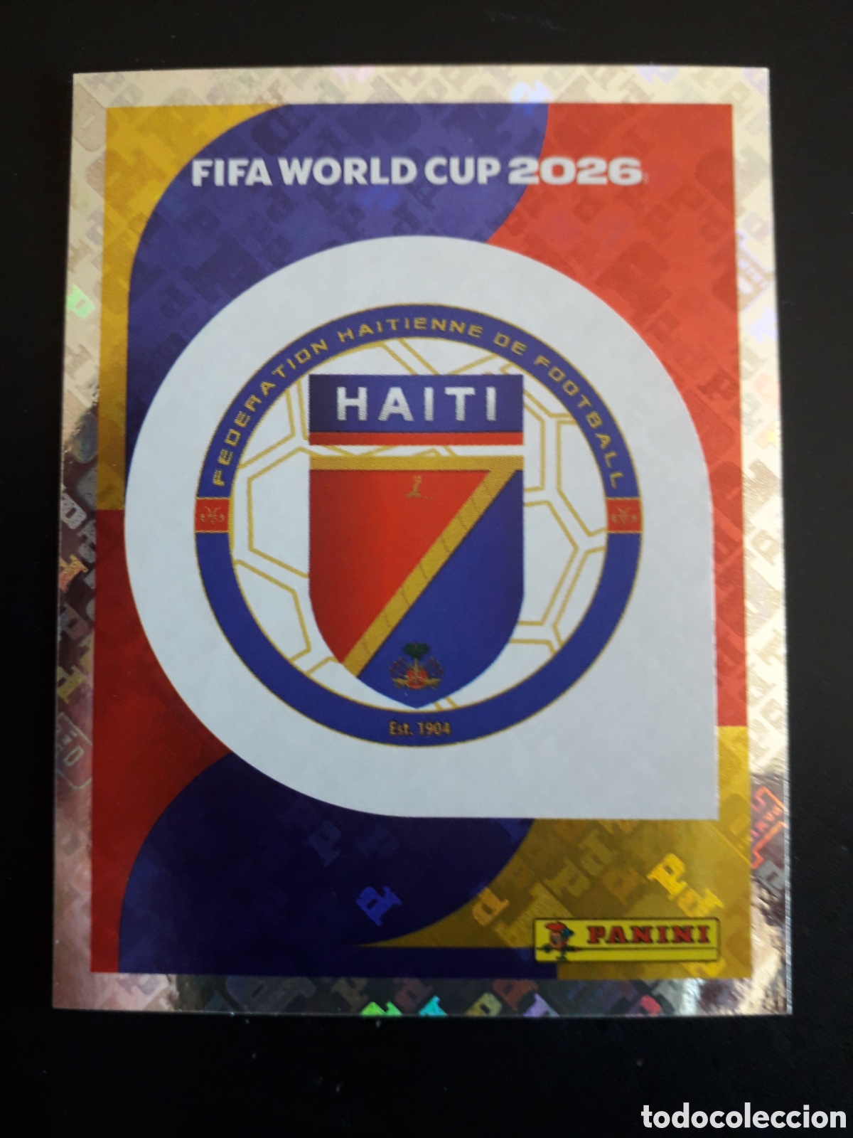 Cromos de f&uacute;tbol: ESCUDO HAIT&Iacute; HAI 1 MUNDIAL F&Uacute;TBOL 2026 FIFA WORLD CUP PANINI SIN PEGAR PEDIDO M&Iacute;NIMO 3&euro;
