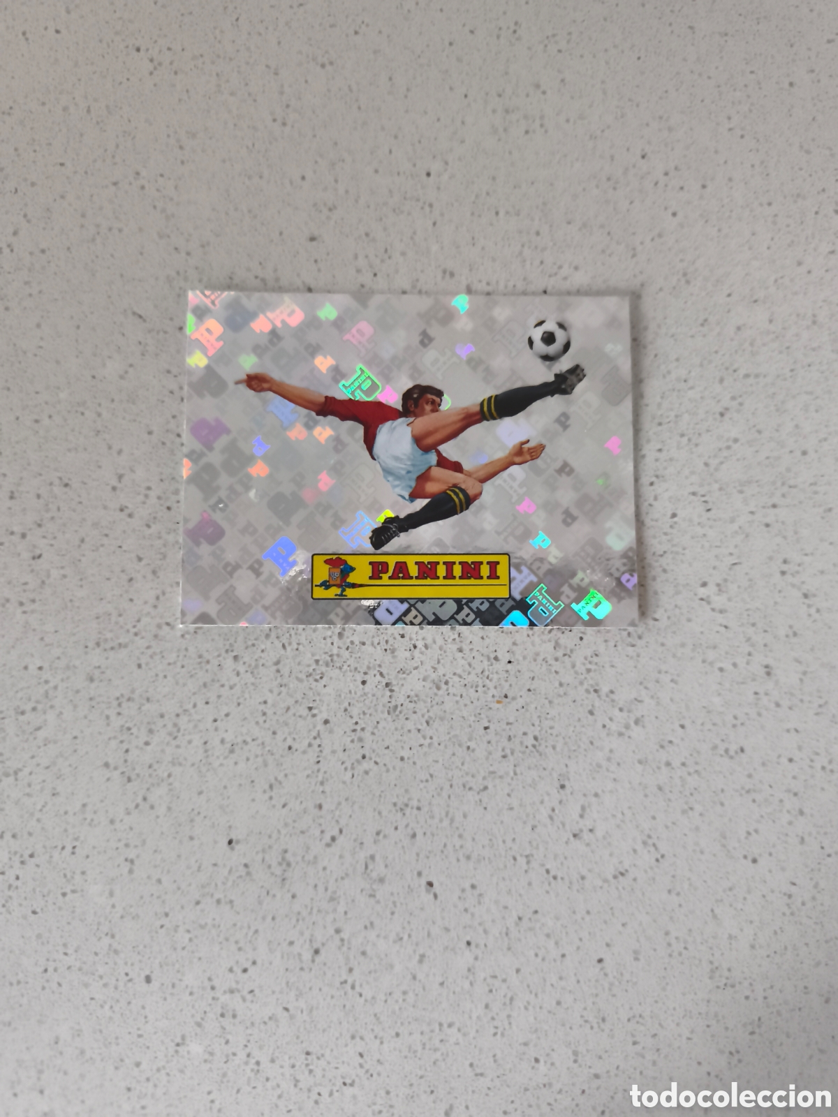 Cartes &agrave; collectionner de Football: CROMO N&Uacute;MERO 00 LOGO PANINI. MUNDIAL 2026.