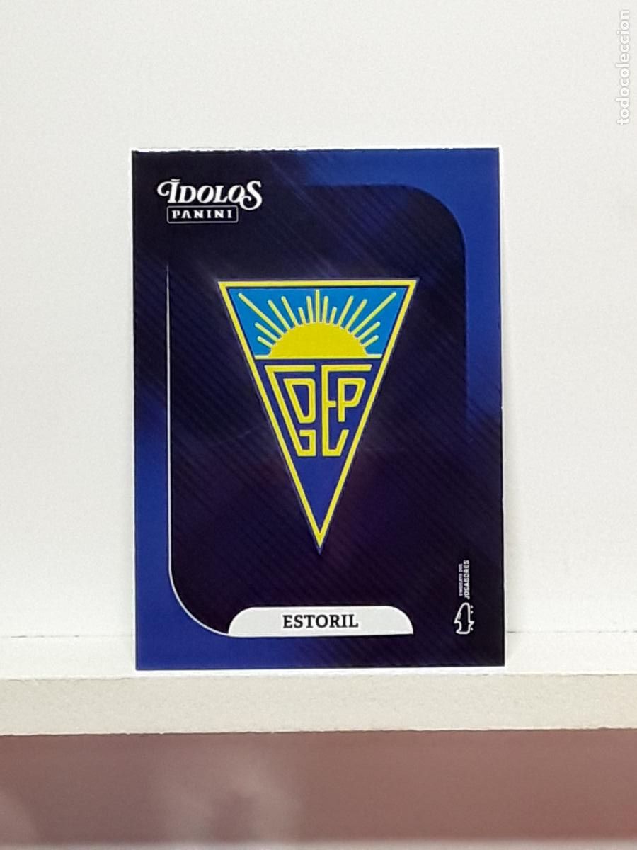 Cromos de f&uacute;tbol: PORTUGUES 2025 2026 IDOLOS 25 26 CROMO PANINI FUTEBOL N 91 ESTORIL ESCUDO LOGO