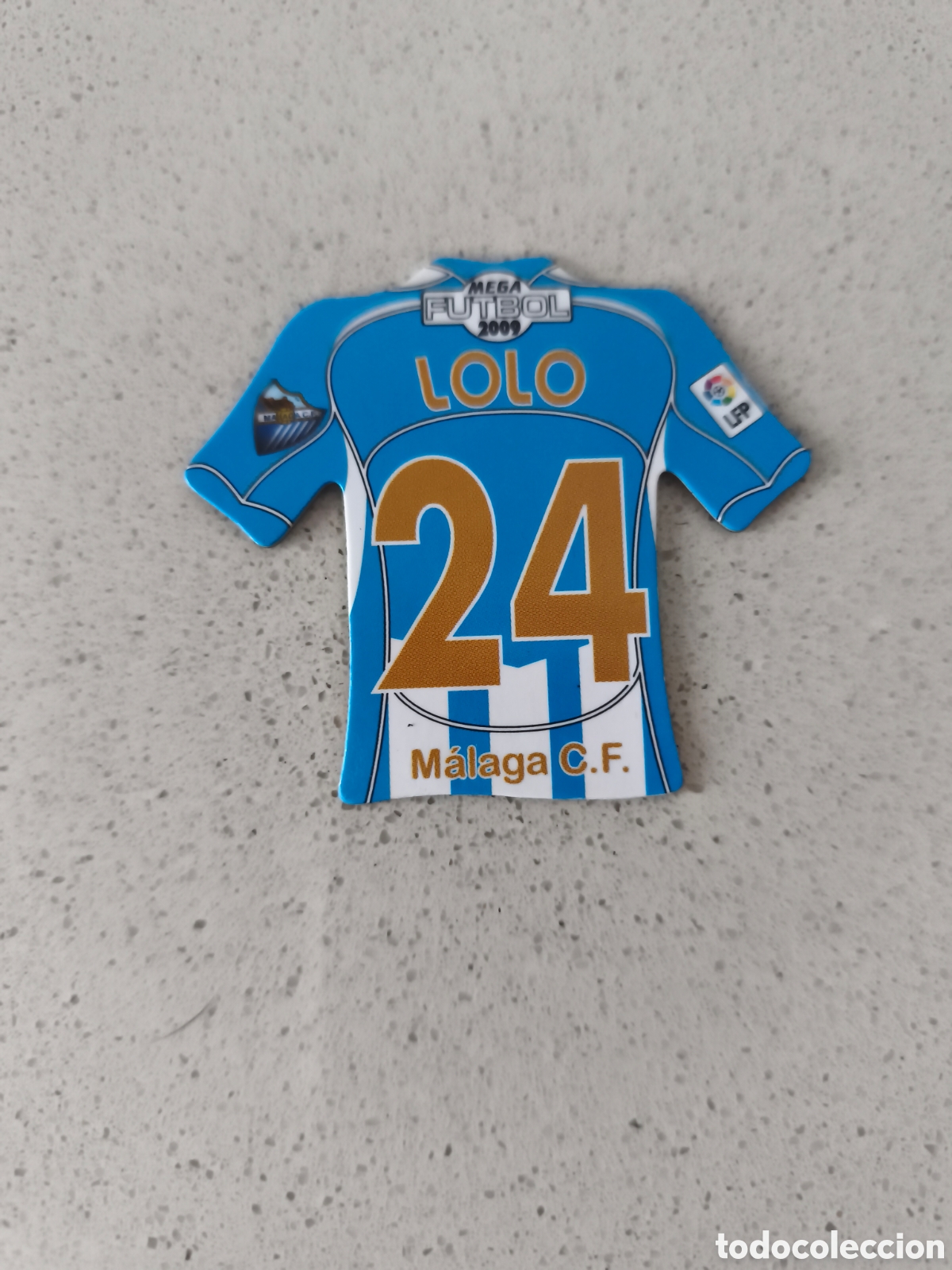 Cromos de f&uacute;tbol: CAMISETA IMAN NUMERO 24 LOLO MALAGA. MEGA FUTBOL MAGNETS 2008-2009