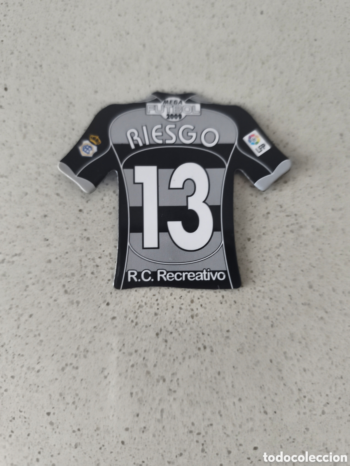 Cromos de f&uacute;tbol: CAMISETA IMAN NUMERO 13 RIESGO RECREATIVO HUELVA. MEGA FUTBOL MAGNETS 2008-2009