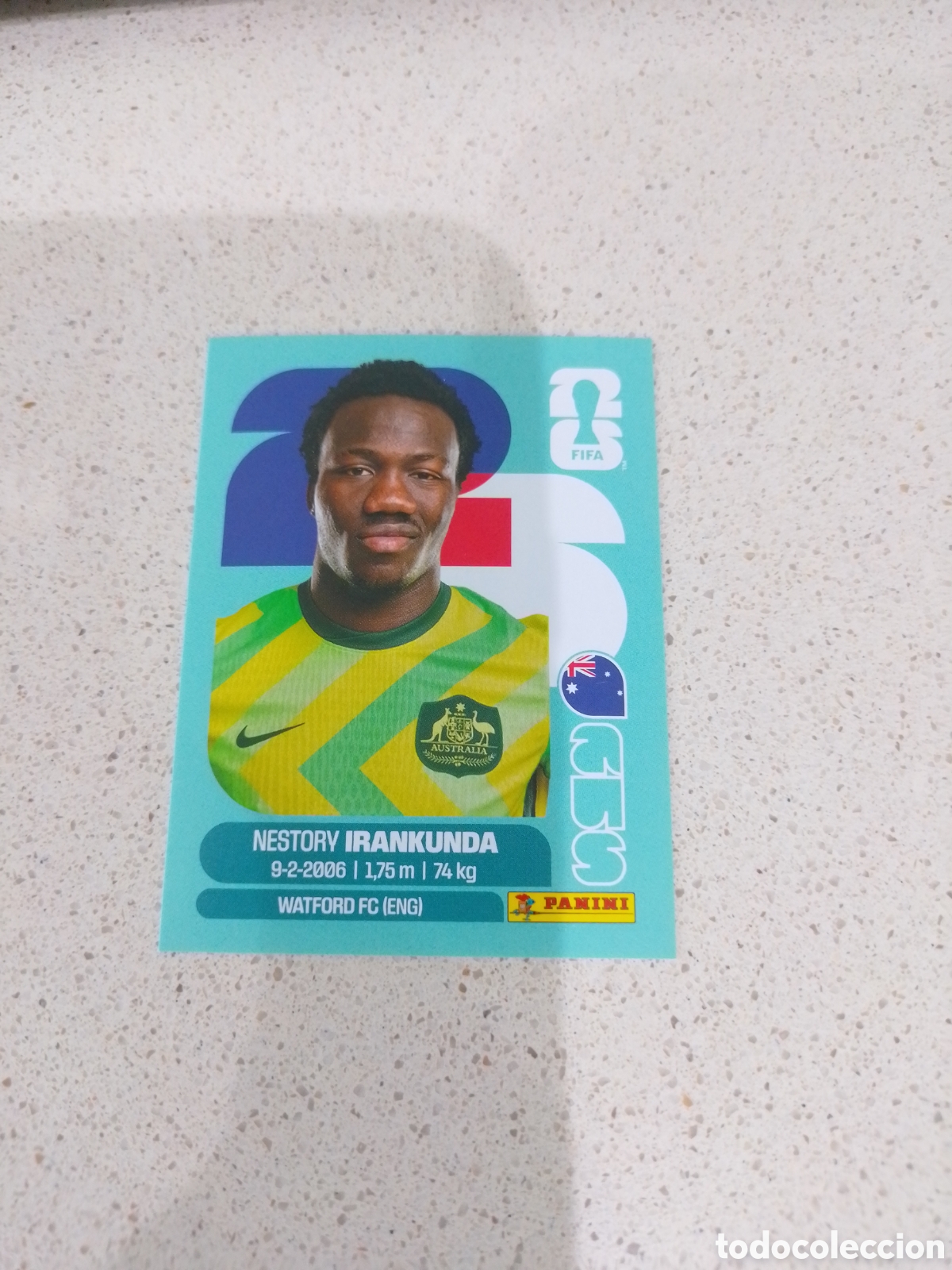 Cromos de f&uacute;tbol: CROMO NUMERO 19 IRANKUNDA AUSTRALIA. MUNDIAL 2026. PANINI.