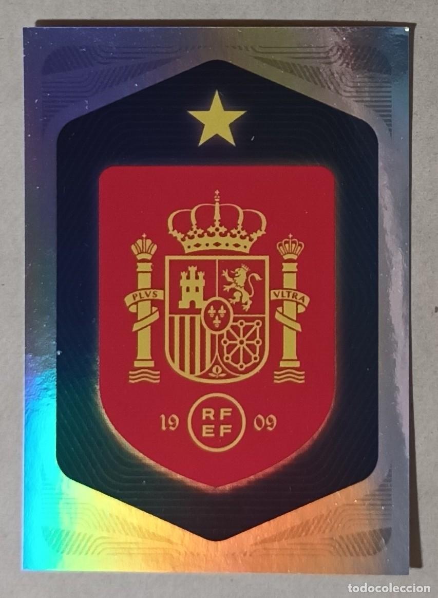 Figurine di Calcio: N&ordm; 1 - ESCUDO - MUNDIAL 2026 26 - CARREFOUR - PANINI