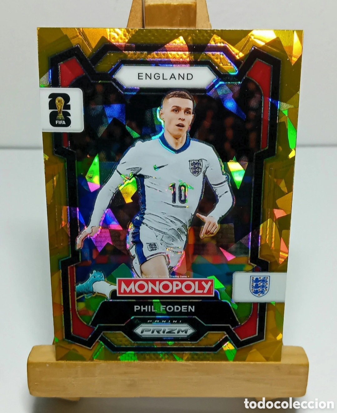 Fu&szlig;ball-Sticker: PHIL FODEN 2026 INGLATERRA MONOPOLY GOLD CRACKED ICE PRIZM PANINI.