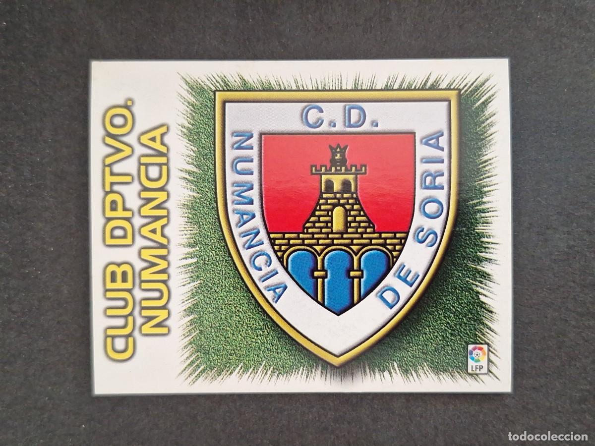 Fu&szlig;ball-Sticker: L4 ESCUDO C. D. NUMANCIA LIGA ESTE 1999 2000 99 00 NUNCA PEGADO SIN PEGAR