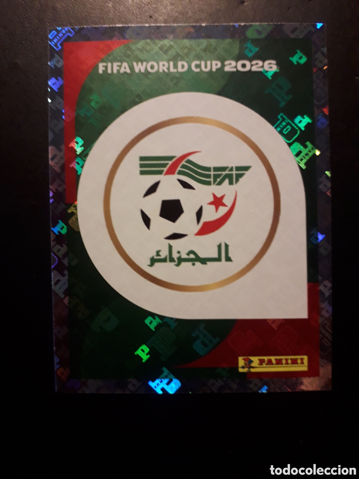 Cromos de f&uacute;tbol: ESCUDO ARGELIA ALG 1 MUNDIAL F&Uacute;TBOL 2026 FIFA WORLD CUP PANINI SIN PEGAR PEDIDO M&Iacute;NIMO 3&euro;