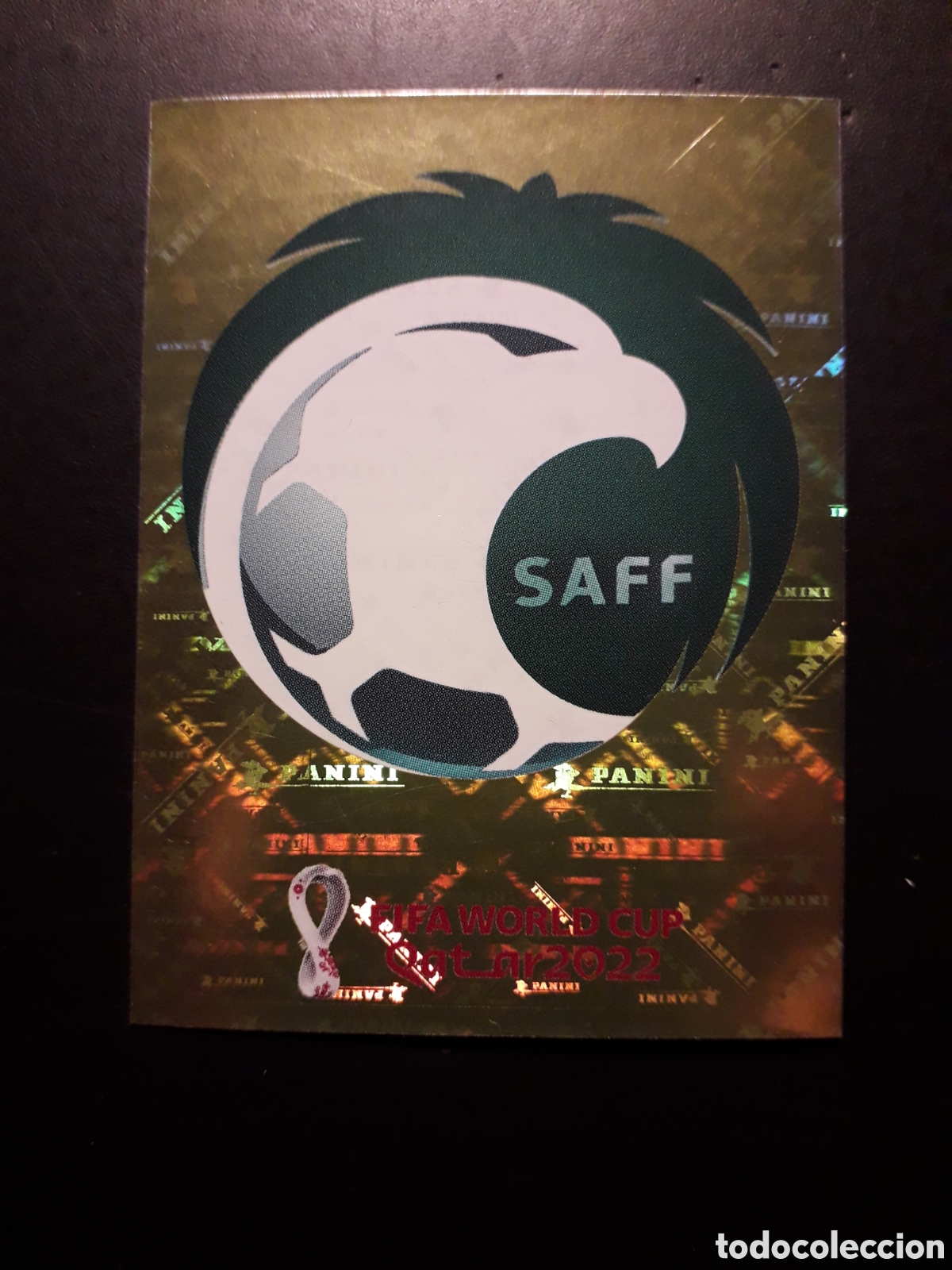 Cromos de f&uacute;tbol: ESCUDO ARABIA SAUD&Iacute; N&deg; 2 COPA MUNDIAL DE F&Uacute;TBOL QATAR 2022 22 PANINI SIN PEGAR PEDIDO M&Iacute;NIMO 3&euro;