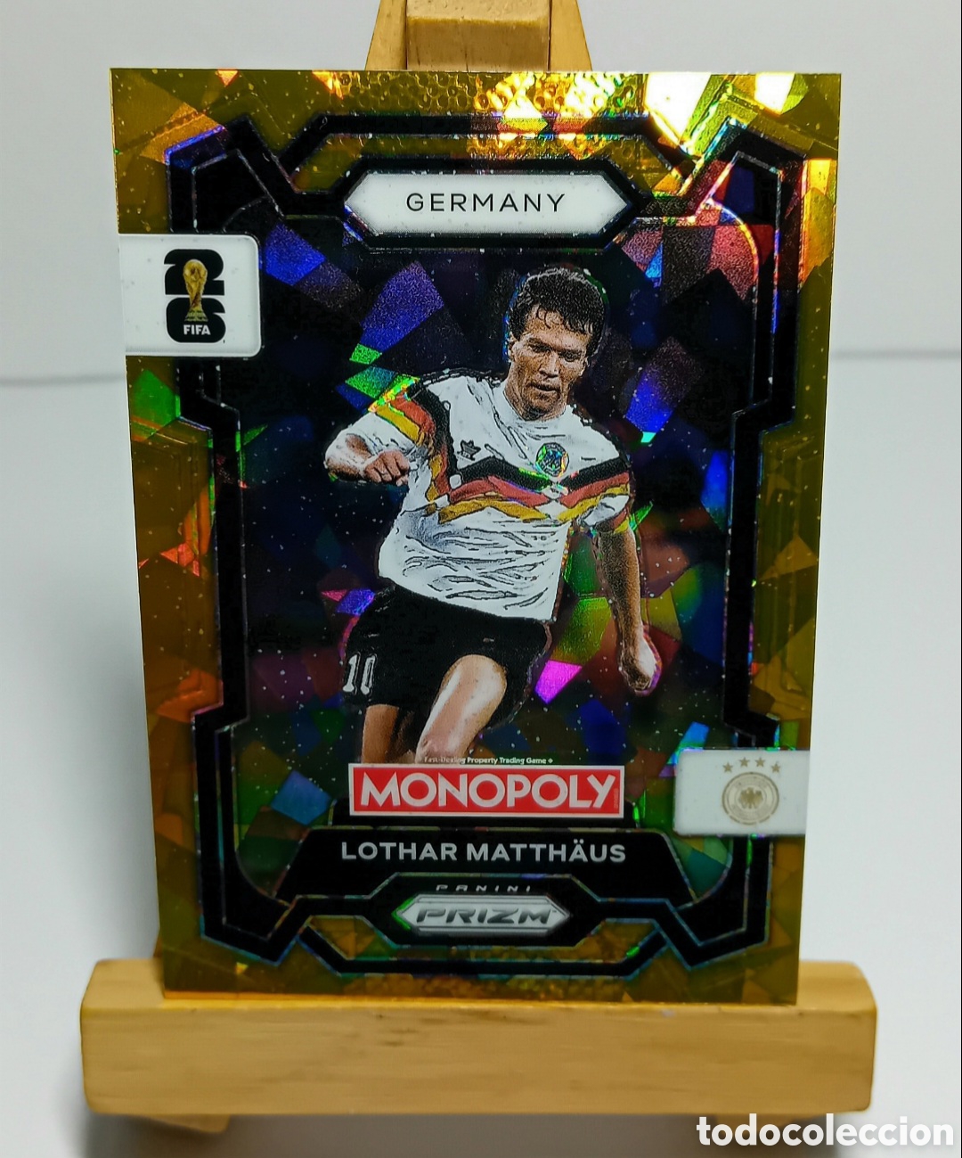 Cromos de f&uacute;tbol: LOTHAR MATTHAUS 2026 ALEMANIA MONOPOLY GOLD CRACKED ICE PRIZM PANINI.