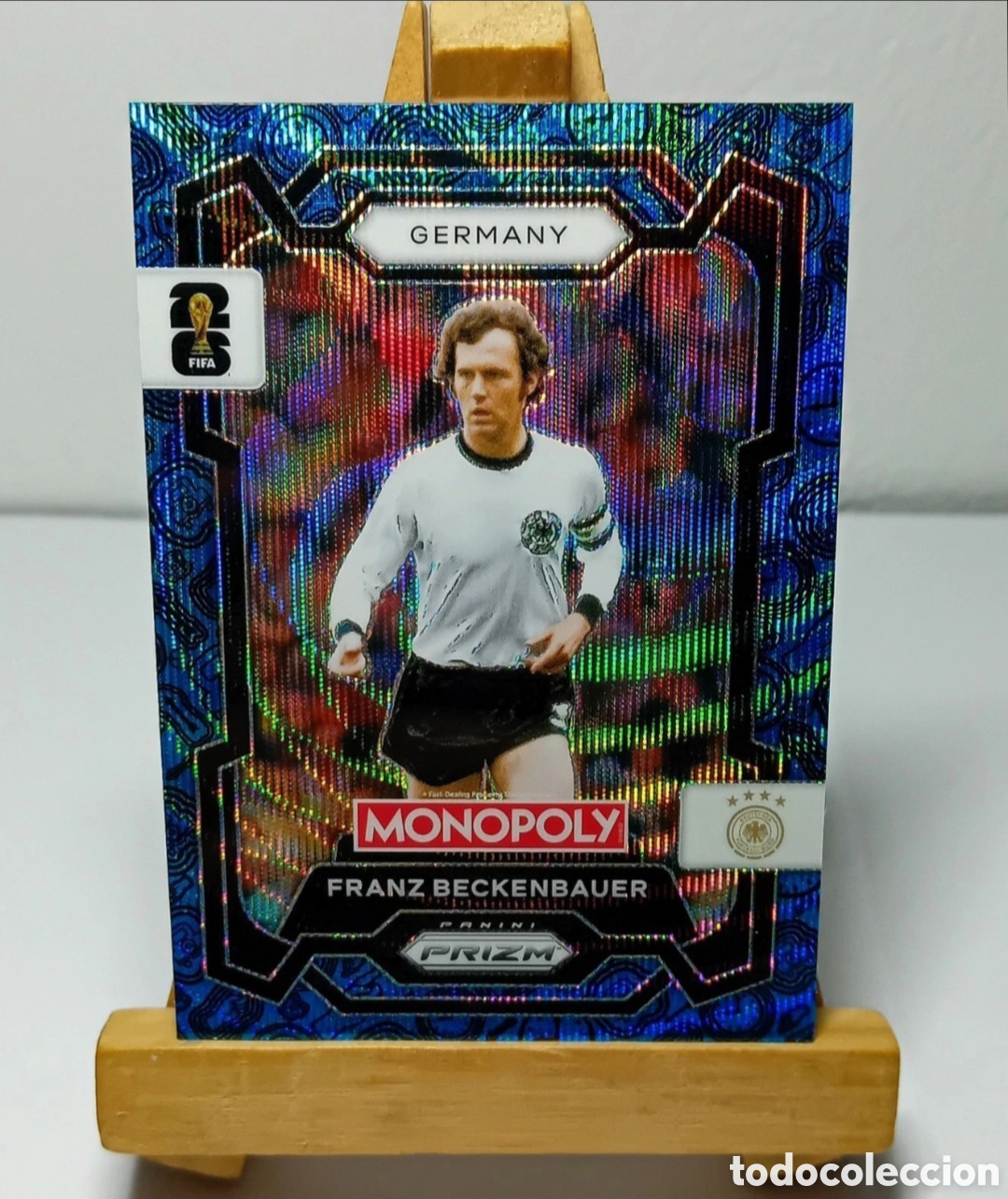 Cromos de f&uacute;tbol: FRANZ BECKENBAUER 2026 ALEMANIA MONOPOLY FOUR CORNERS BLUE WAVE PRIZM PANINI.