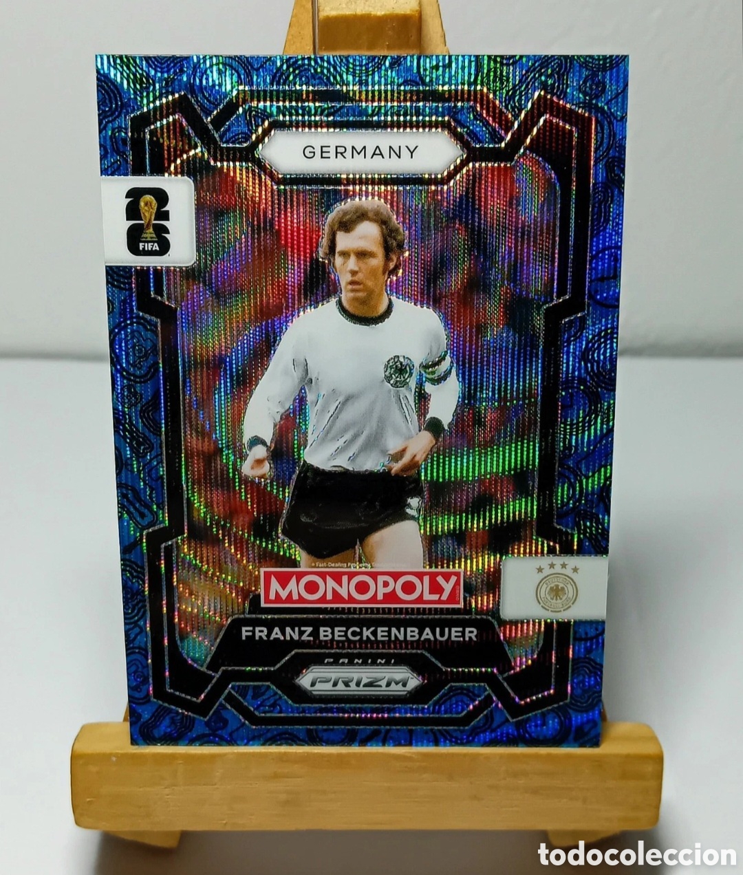 Cromos de f&uacute;tbol: FRANZ BECKENBAUER 2026 ALEMANIA MONOPOLY FOUR CORNERS BLUE WAVE PRIZM PANINI.