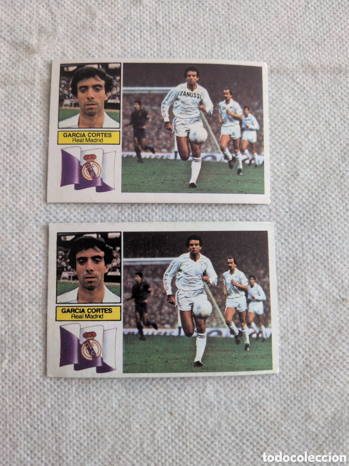 Cromos de f&uacute;tbol: DOS CROMOS LIGA ESTE 82 83 EDICIONES ESTE GARCIA CORTES REAL MADRID CON Y SIN PUBLICIDAD. SIN PEGAR