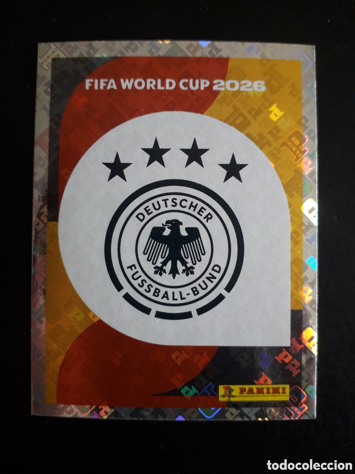 Cromos de f&uacute;tbol: ESCUDO ALEMANIA GER 1 MUNDIAL F&Uacute;TBOL 2026 FIFA WORLD CUP PANINI SIN PEGAR PEDIDO M&Iacute;NIMO 3&euro;