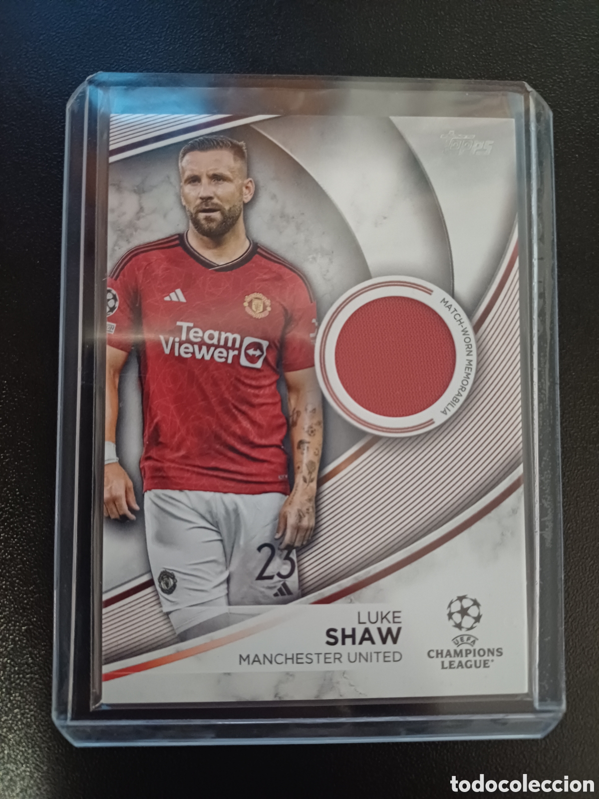 Cromos de f&uacute;tbol: #TS-LW LUKE SHAW MANCHESTER UNITED RELIC CARD TOPPS UEFA CLUB COMPETITIONS 2023/24