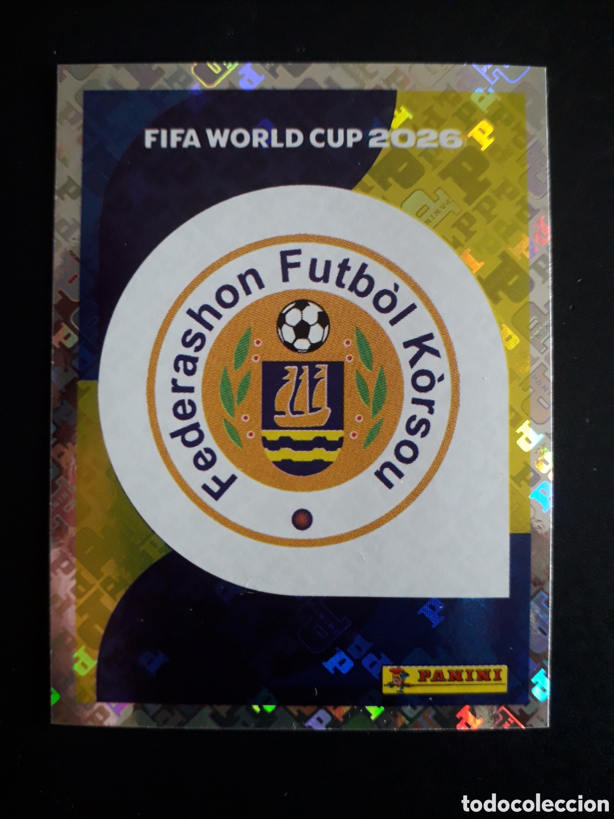 Cromos de f&uacute;tbol: ESCUDO CURA&Ccedil;AO CUW 1 MUNDIAL F&Uacute;TBOL 2026 FIFA WORLD CUP PANINI SIN PEGAR PEDIDO M&Iacute;NIMO 3&euro;