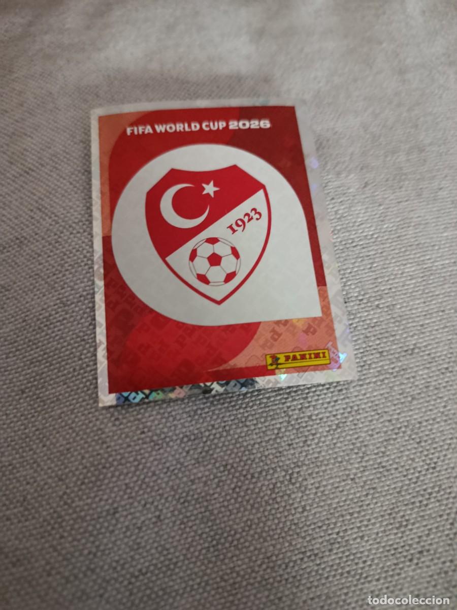 Cromos de Futebol: Mundial Estados Unidos-Mexico-Canad&aacute; 2026. 1- Escudo. Turqu&iacute;a. Nunca pegado.
