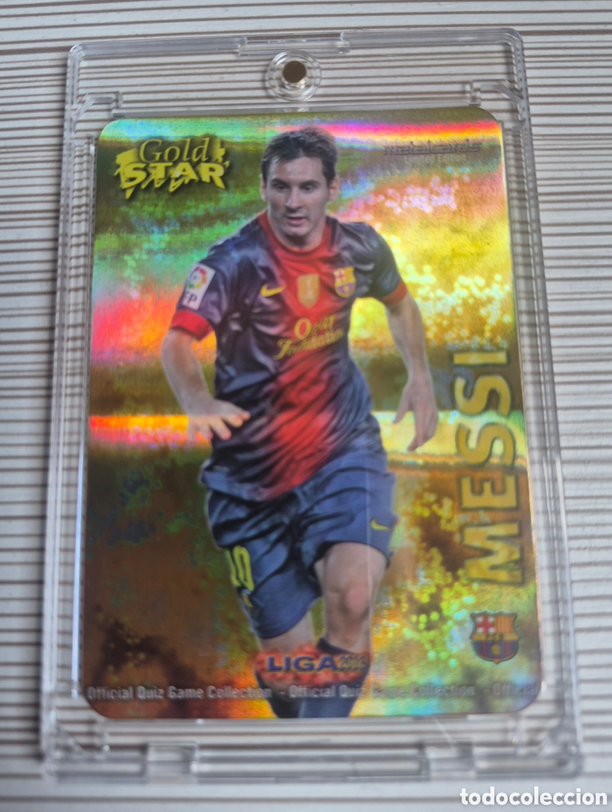 Cromos de f&uacute;tbol: MESSI GOLD STAR RAYAS/AGUAS MUNDICROMO 2012 2013 IMPOLUTO!!