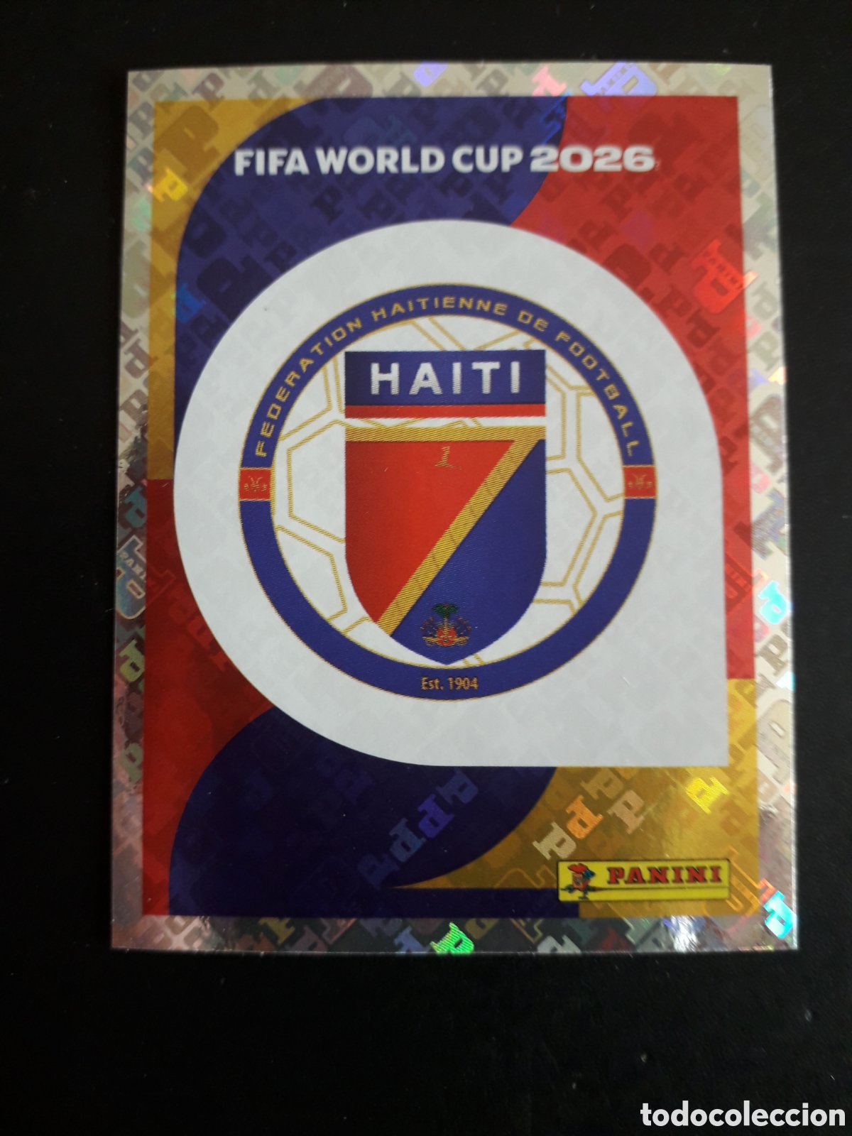 Cromos de f&uacute;tbol: ESCUDO HAIT&Iacute; HAI 1 MUNDIAL F&Uacute;TBOL 2026 FIFA WORLD CUP PANINI SIN PEGAR PEDIDO M&Iacute;NIMO 3&euro;