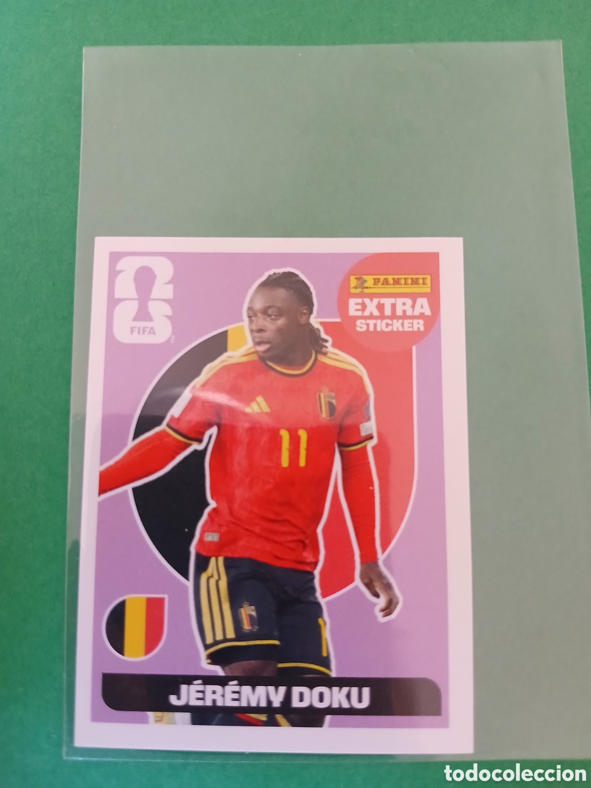 Cromos de f&uacute;tbol: JEREMY DOKU BELGICA BASE MORADO EXTRA STICKER ⚽ PANINI FIFA MUNDIAL WORLD CUP 26 2026 STICKER ⚽