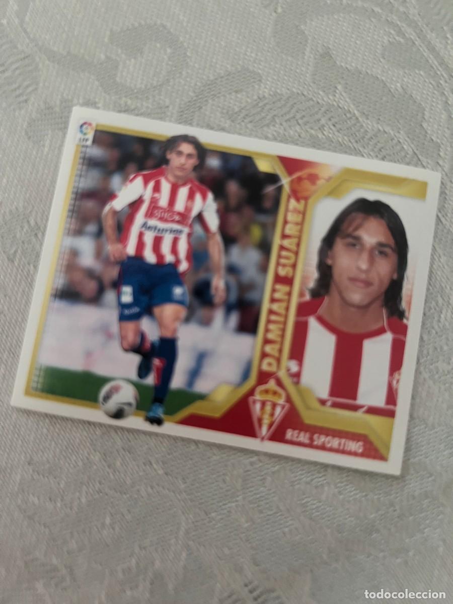 Cromos de f&uacute;tbol: DAMIAN SUAREZ SPORTING GIJON COLOCA SIN PEGAR ALBUM ESTE LIGA 2011 - 2012