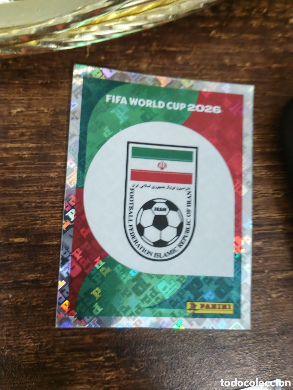 Cromos de f&uacute;tbol: IRN 1 Escudo logo emblema Rep&uacute;blica Isl&aacute;mica de Ir&aacute;n, Panini FIFA World Cup Mundial 2026 Sticker