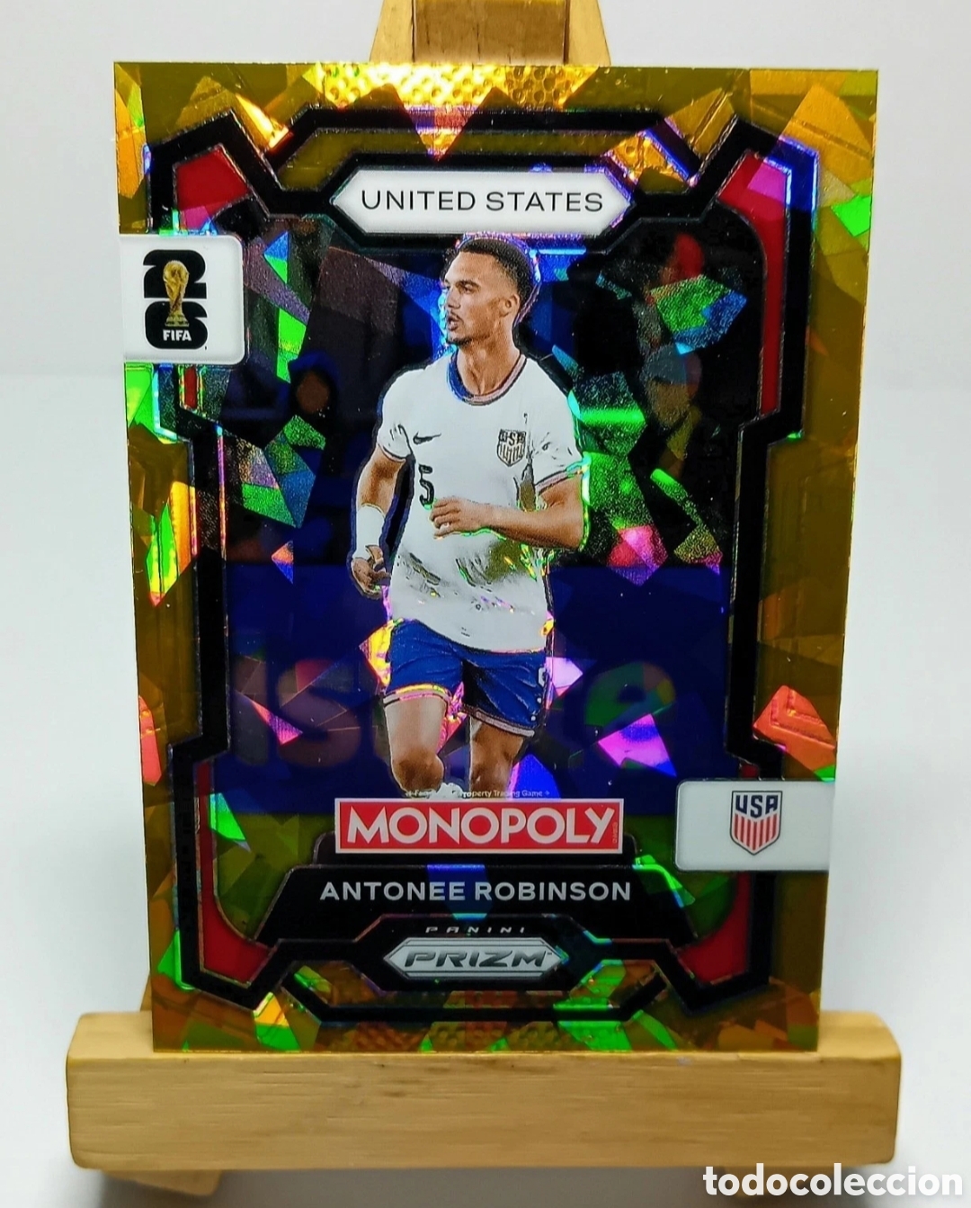 Cromos de f&uacute;tbol: ANTONEE ROBINSON 2026 USA GOLD CRACKED ICE MONOPOLY PRIZM PANINI.