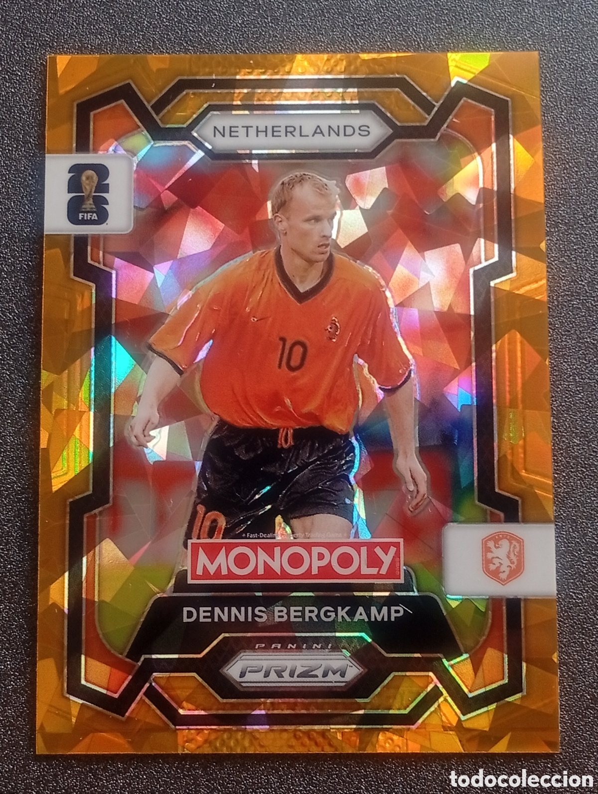 Football Stickers: 74 prizm paralela cracked BERGKAMP MONOPOLY FIFA 2026 WORLD CUP MUNDIAL ADRENALYN