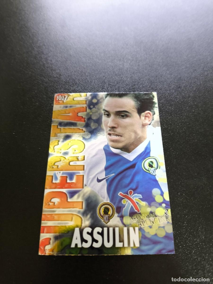 Fu&szlig;ball-Sticker: 1017 ASSULIN SUPERSTAR BRILLO LISO HERCULES MUNDICROMO LIGA 2013 2014 13 14 PLATINUM NO PANINI ESTE