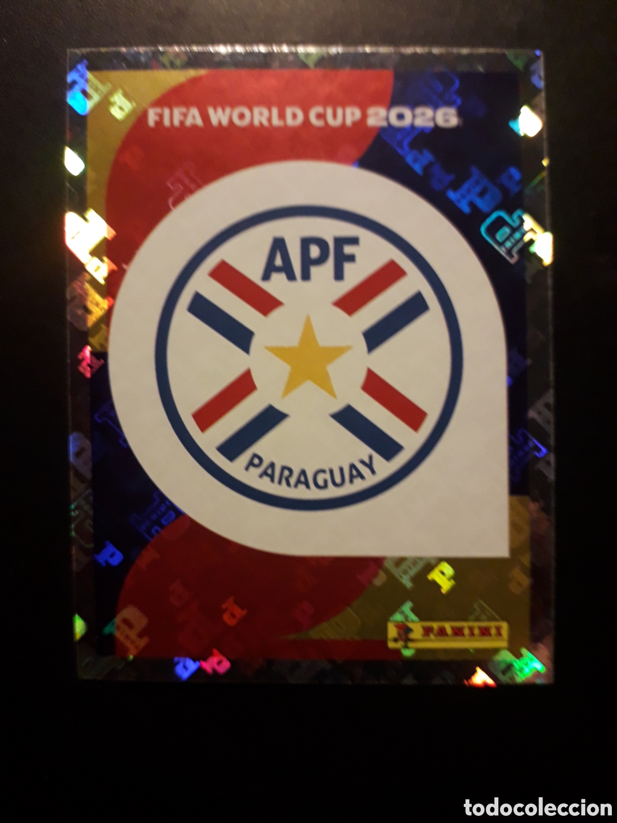 Cromos de f&uacute;tbol: ESCUDO PARAGUAY PAR 1 MUNDIAL F&Uacute;TBOL 2026 FIFA WORLD CUP PANINI SIN PEGAR PEDIDO M&Iacute;NIMO 3&euro;